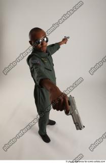 18 2018 01  ERIC PILOT STANDING POSE WITH GUNS